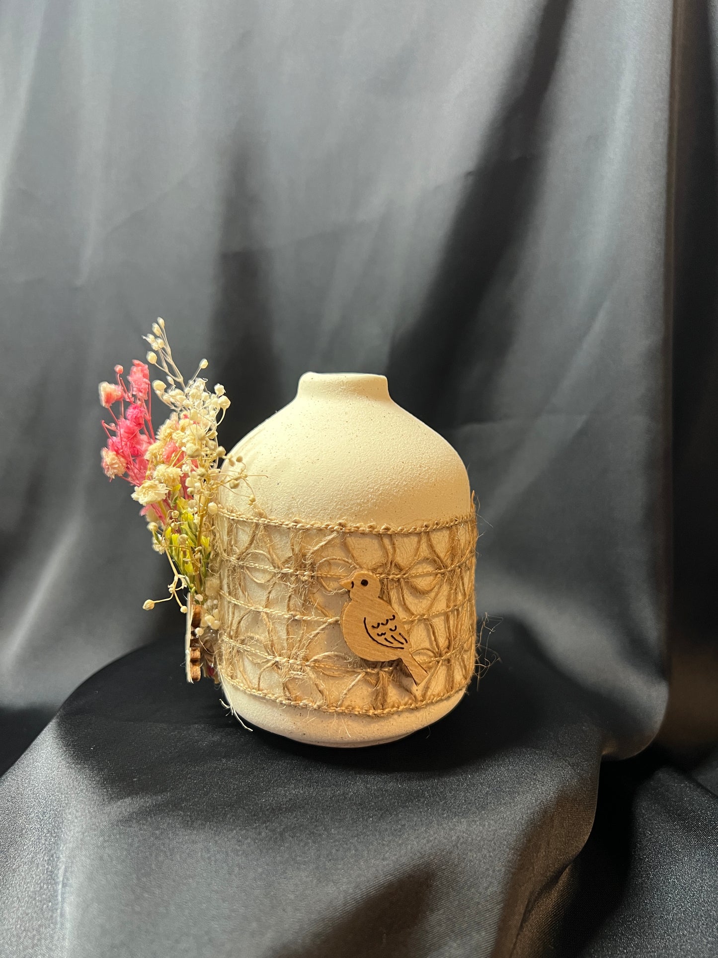 Decorative Ceramic Vase with Dried Flowers and Wooden Bird Accent