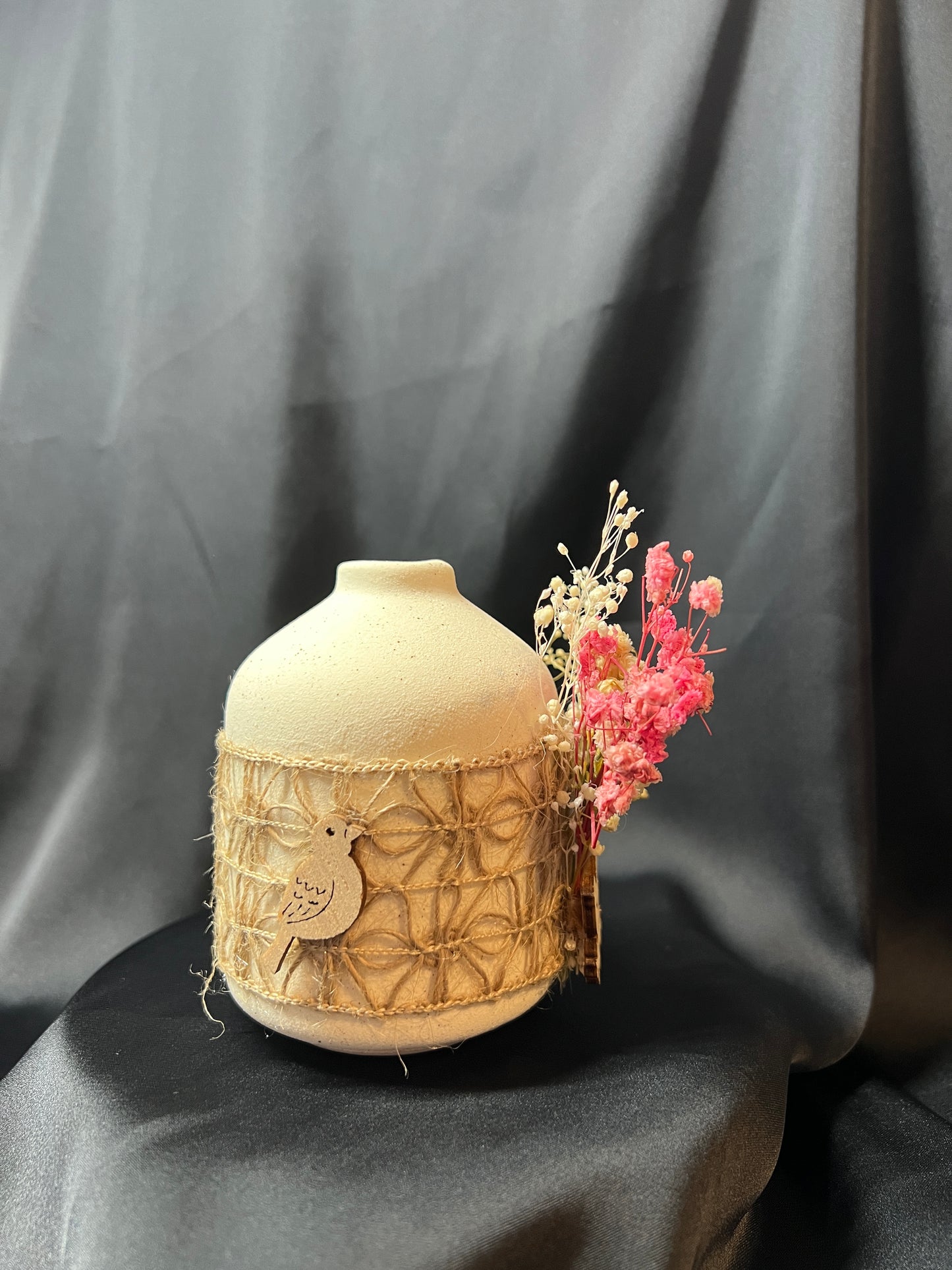 Decorative Ceramic Vase with Dried Flowers and Wooden Bird Accent